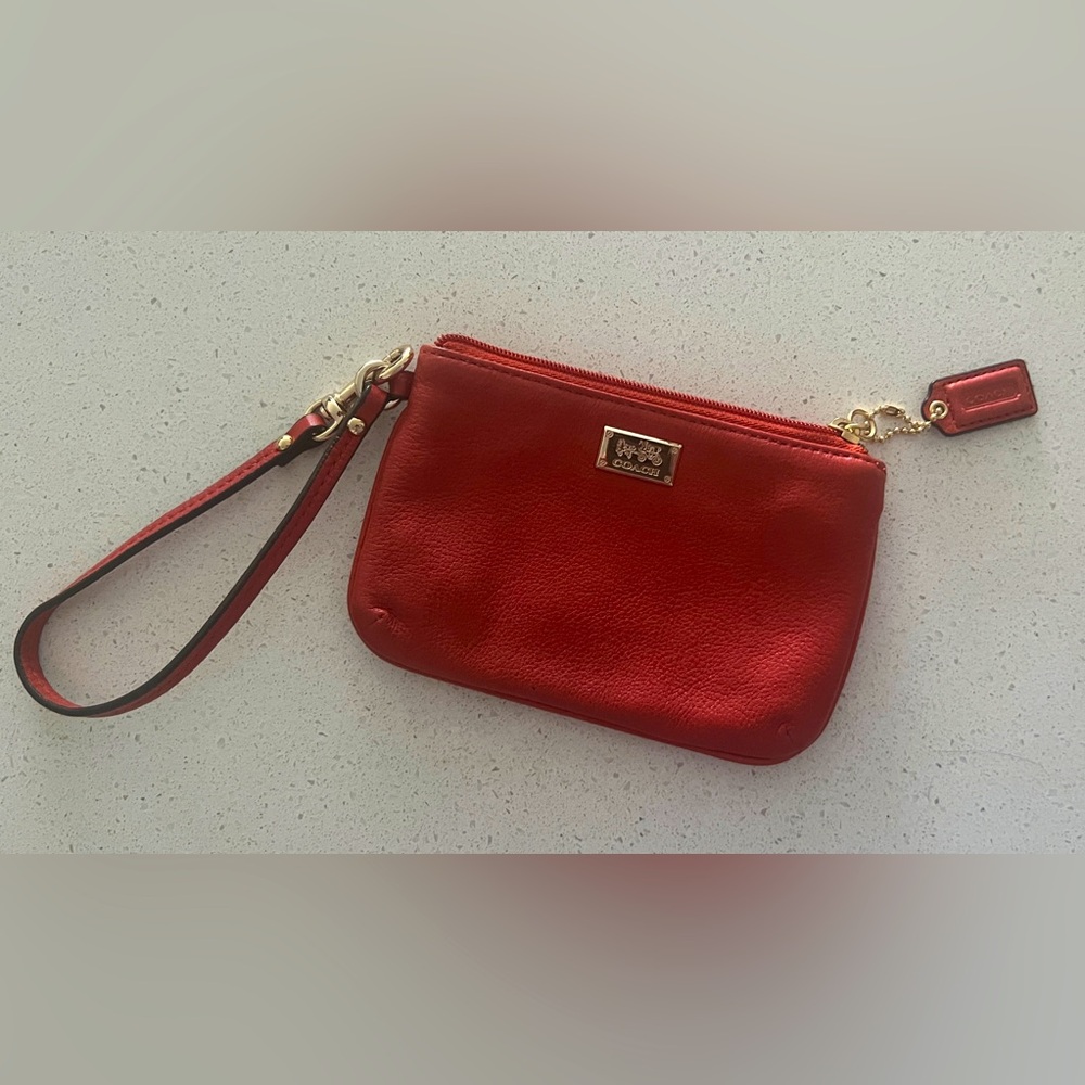 Coach wristlet, bright orange/red